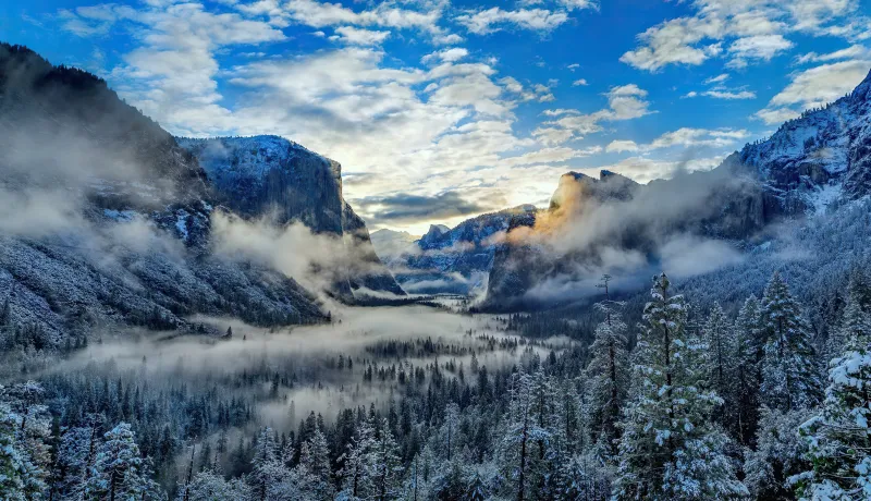 Fog And Clouds Over Snowy Winter Mountain 4k Wallpaper