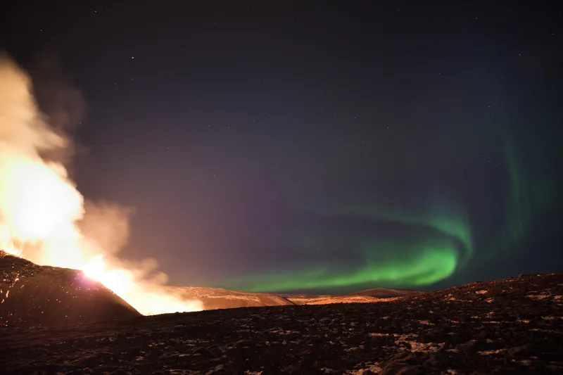 Northern Lights Over The Fagradalsfjall Volcanic Eruption In Geldingadalur In Iceland 5k Wallpaper