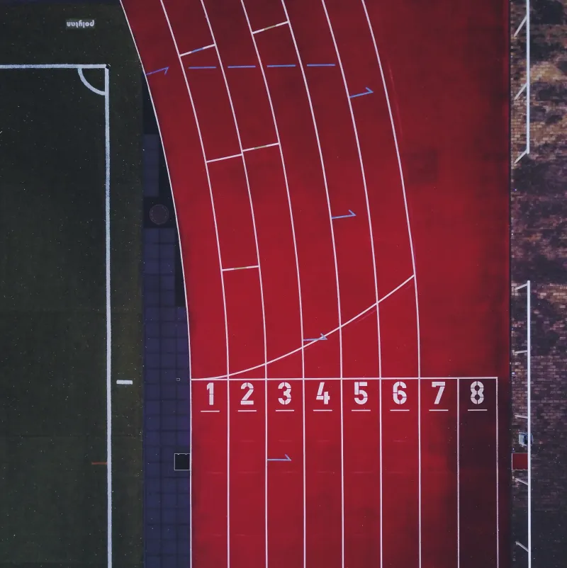 Aerial View Of Racing Track Numbers Wallpaper