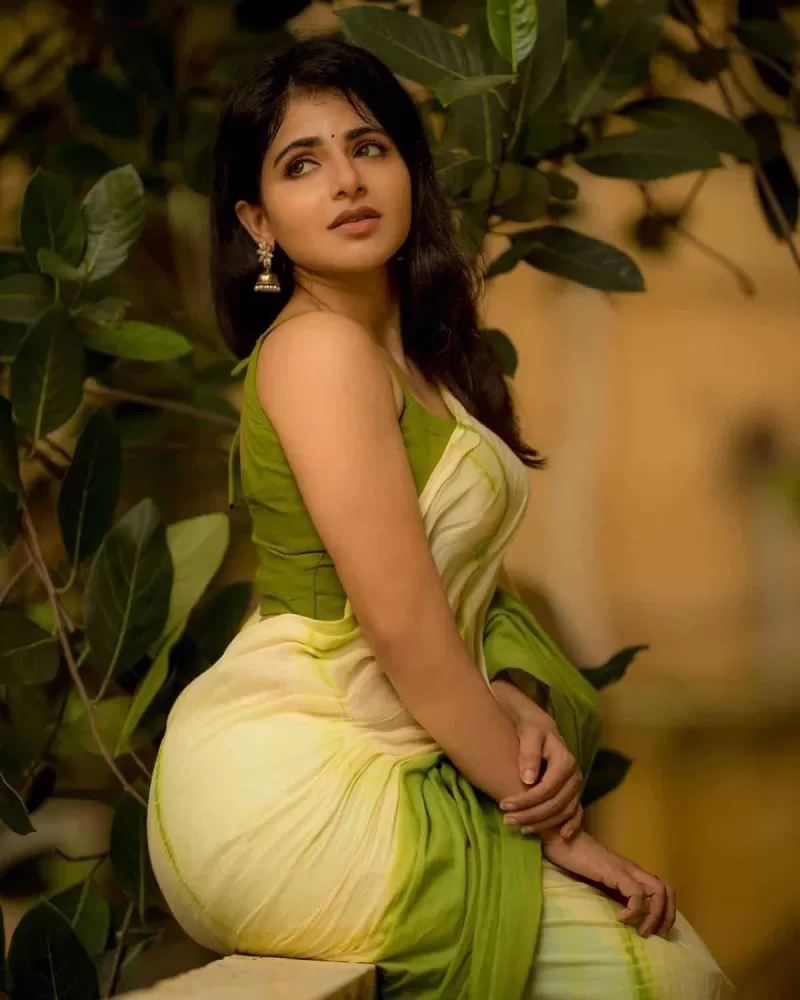 South Indian actress Iswarya Menon in green saree