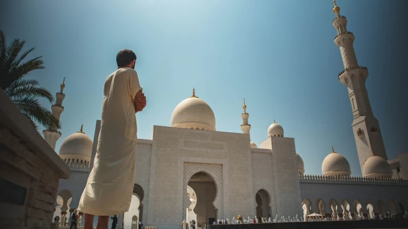 Man Standing Near Mosque 4K 5K HD Wallpaper