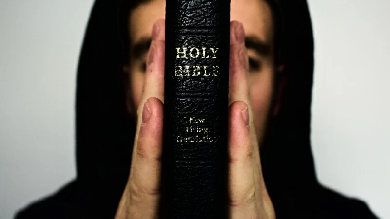 Person Holding Holy Bible 4K 5K HD Wallpaper