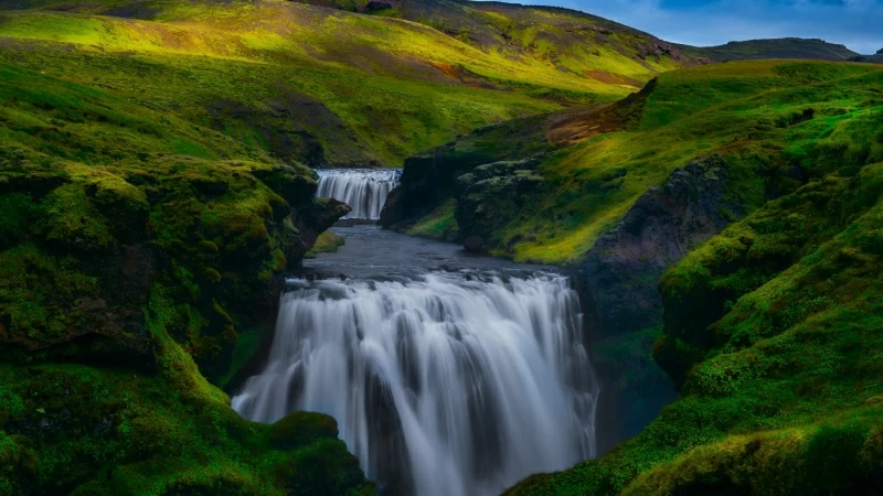 Green Covered Mountain Between Waterfall 4K 5K HD Wallpaper