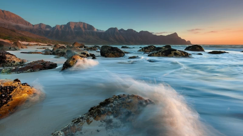 Black Rocks Between Long Waves Exposure During Daytime 4K HD Nature Wallpaper